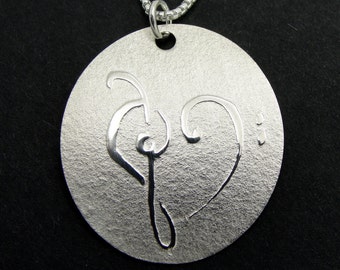 Sterling Silver Disc Necklace with Treble and Bass Clef Heart