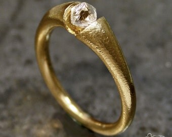 Rose gold ring with rough diamond