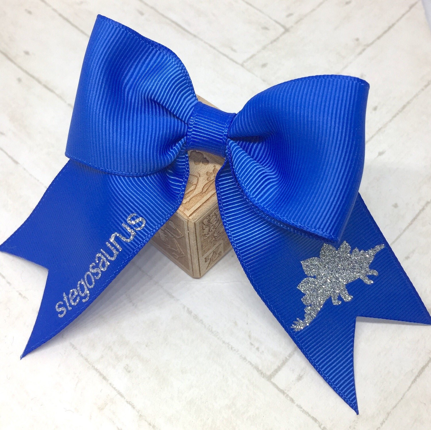 dinosaur hair bow
