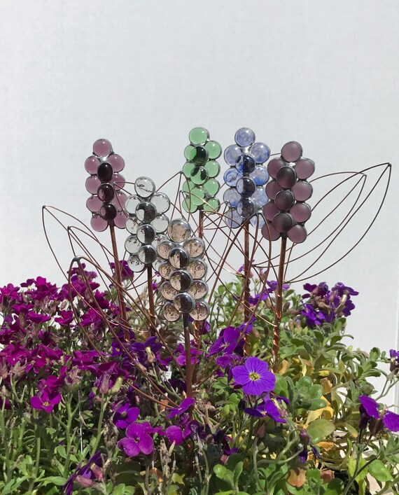 Items similar to Glass Hyacinth Flower Garden Stakes with Copper