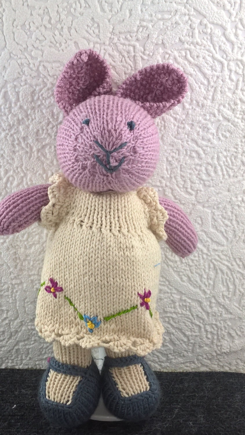 Beautiful little pink bunny rabbit. Stuffed baby toy. Soft toy