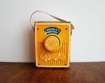 1977 Fisher Price Pocket Radio Musical Toy - playing "I Whistle a Happy Tune"