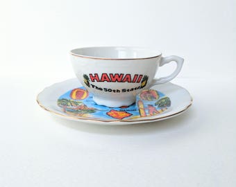 Vintage Hawaiian Mid Century Souvenir Tea Cup and Saucer Aloha Hawaii The 50th State Made in Japan Hula Tiki Surfer Island Map Kamehameha