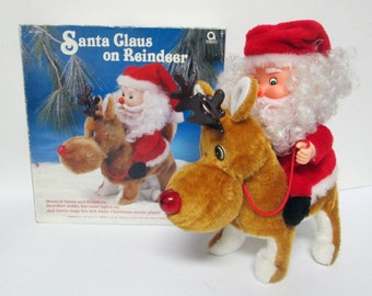 Vintage Musical Santa Claus on Reindeer Christmas Figurine Lighted Decoration Amscan