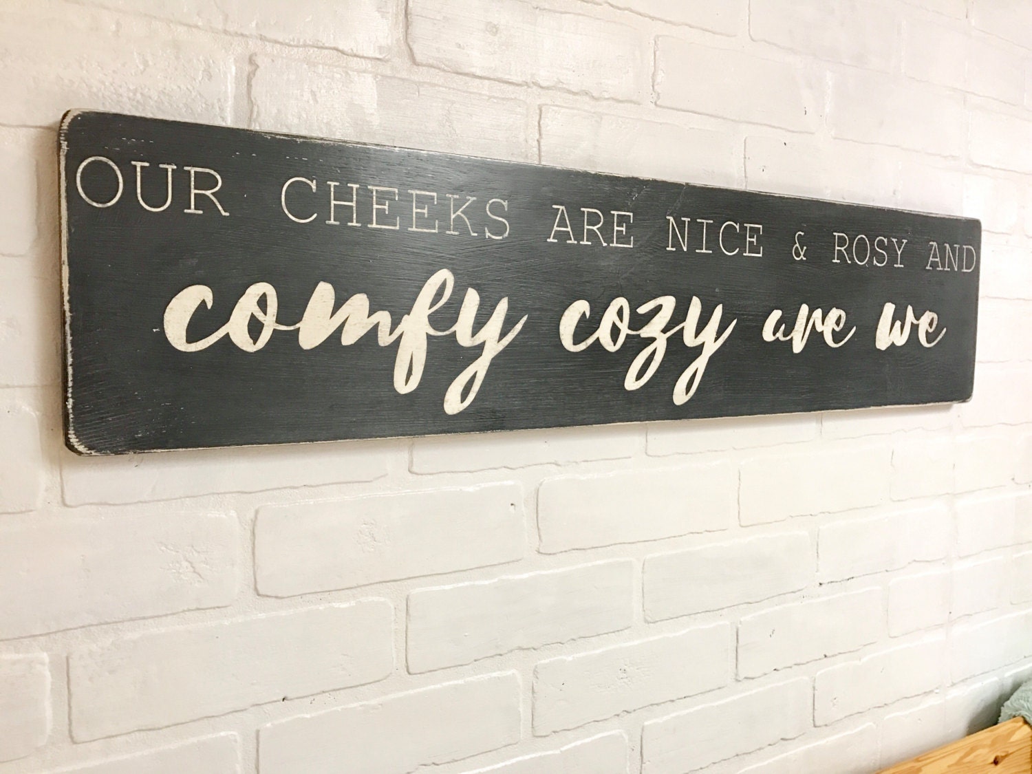 Our cheeks are nice and rosy and comfy cozy are we bedroom