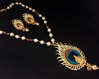 The rain's Peacock - gold brass necklace main image 1