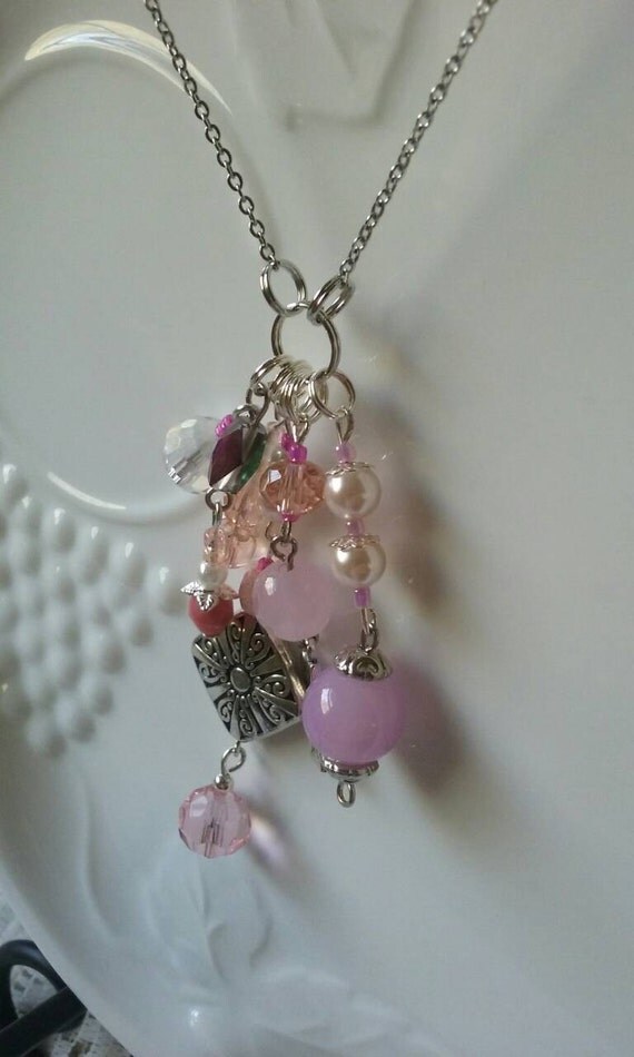 Pink glass charm necklace on a 2426 stainless
