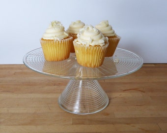 Vintage glass cake stand, plate with a striped pattern and geometric base.