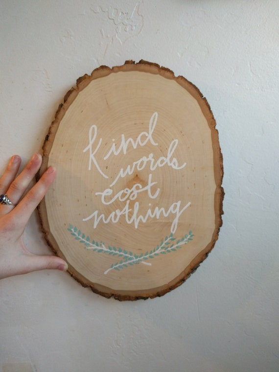 kind-words-cost-nothing-wood-round