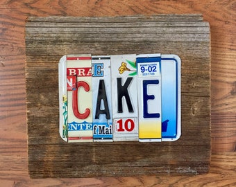 CAKE license plate sign tomboyART art recycled upcycled SOUL FooD pig BBQ Mississippi blues