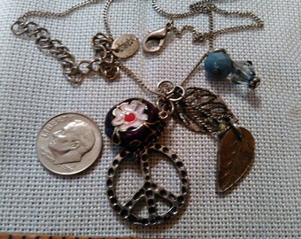 Nice necklace "claires" multi charms,hangs 10 1/2" when wearing