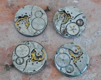 0.9 inch Set of 4 vintage wrist watch movements.