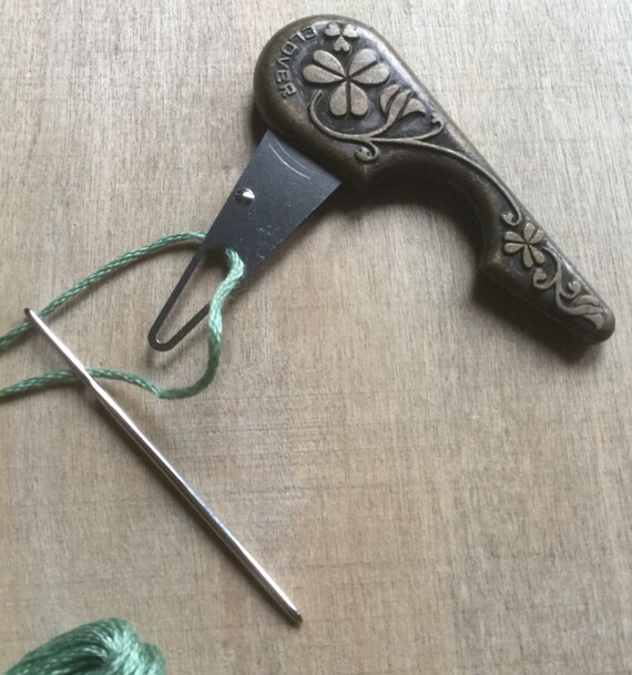 Needle threader for yarn in antique metal