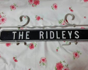 The Ridleys sign fence post or repurposed