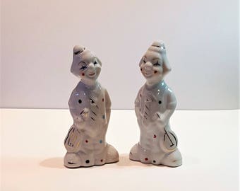 Set of Two Vintage Porcelain Clown Musician Figurines presented by Donellensvintage