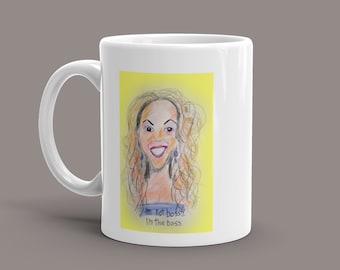 Beyonce coffee mug caricature with saying "I'm not bossy, I'm the boss." Colorful and cute.