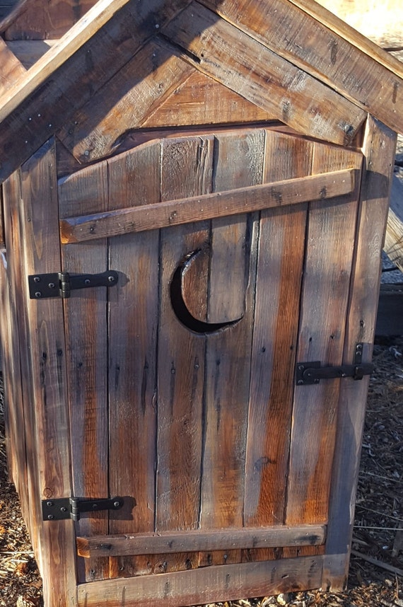Rustic reclaimed distressed pallet wood outhouse cat litter