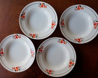 Late art deco: four beautiful decorated soup plates, by Boch Louviére Belgium, abstract floral design in red and black with gold rim