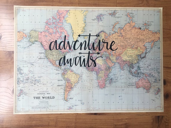 hand lettered world map adventure awaits travel quote