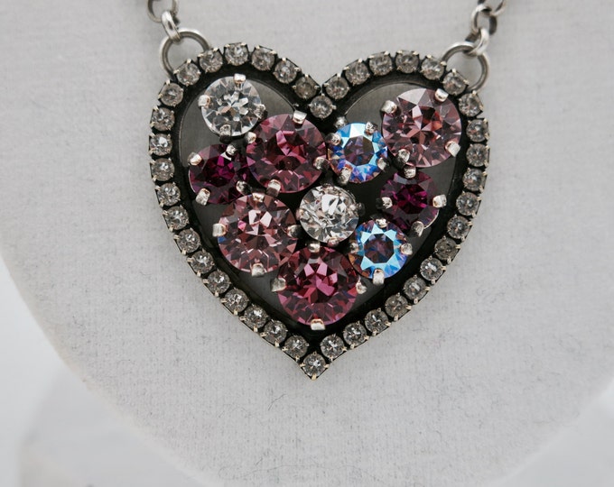 Limited edition necklace that you will want to wear for years to come! Swarovski crystal pink heart pendant.