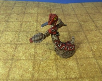 snake man figurine