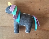 black unicorn plush toy