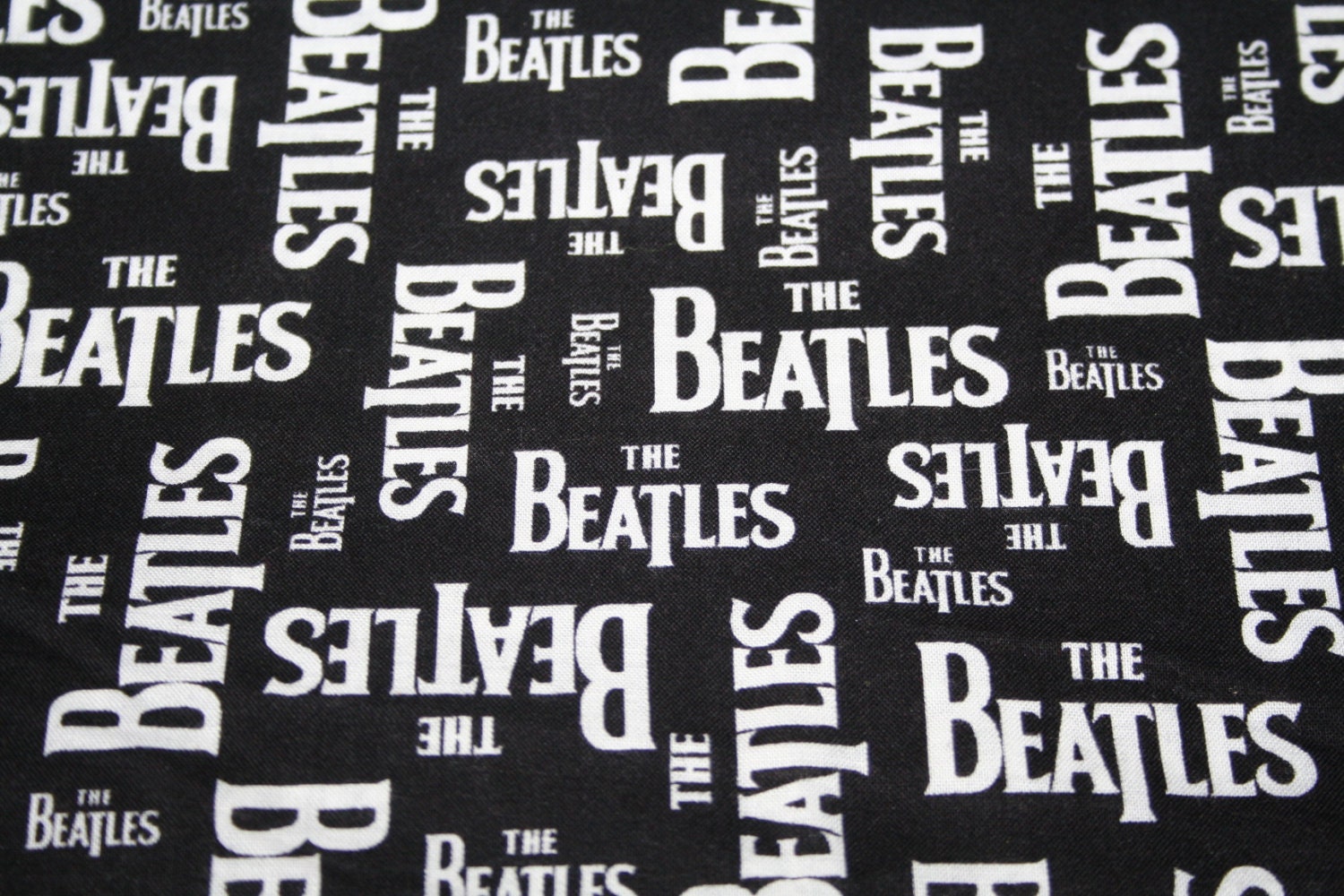 Beatles Fabric The Beatles Logo Fabric White on Black / OOP
