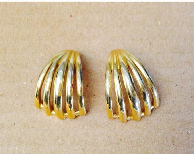 Storewide 25% Off SALE Vintage Gold Tone Wingback Trifari Designer Signed Earrings Featuring Elegant Open Style Design