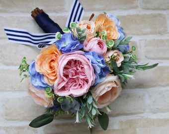 Bridal Wedding Bouquet. Roses, succulents, hydrangea, wildflowers and eucalyptus foliage. Summer garden bouquet in pink, blue and coral