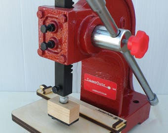 Embossing press for soap stamp