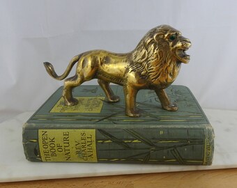 Vintage Solid Brass Lion Figurine, Hollywood Regency Statue, Lion with Emerald Eyes Figure
