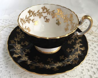 Aynsley China Tea Cup and Saucer, Black with Gold Gilding and Trim