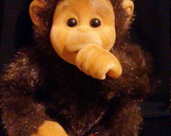 monkey sucking thumb toy