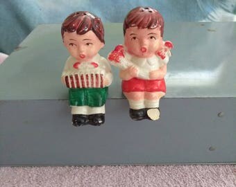 Vintage Boy and Girl Sitting Salt N Pepper Shakers