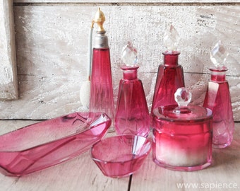 Beautiful French antique Baccarat 7 pc vanity set cranberry color