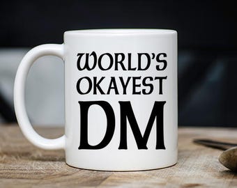 Awesome Dungeons and Dragons Gift - World's Okayest DM Coffee & Tea Mug - Best Unique DnD Roleplay Teacup - 11oz Ceramic Roleplaying Cup