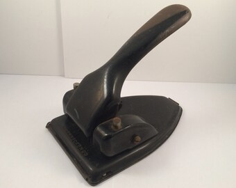 Vintage black iron Soennecken 20 hole puncher