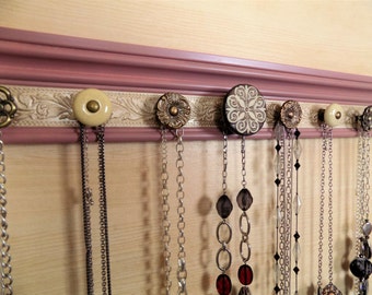 Wall jewelry holder. This necklace rack/ jewelry organizer in Vintage blush and champagne has 7 decorative knobs 20" gift of storage
