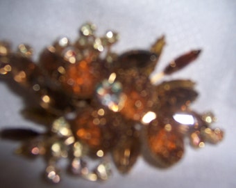 BROOCH in BROWN STONES