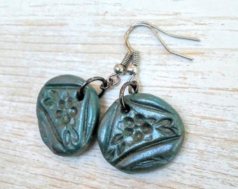 Items similar to Live - Stamped Clay Earrings on Etsy