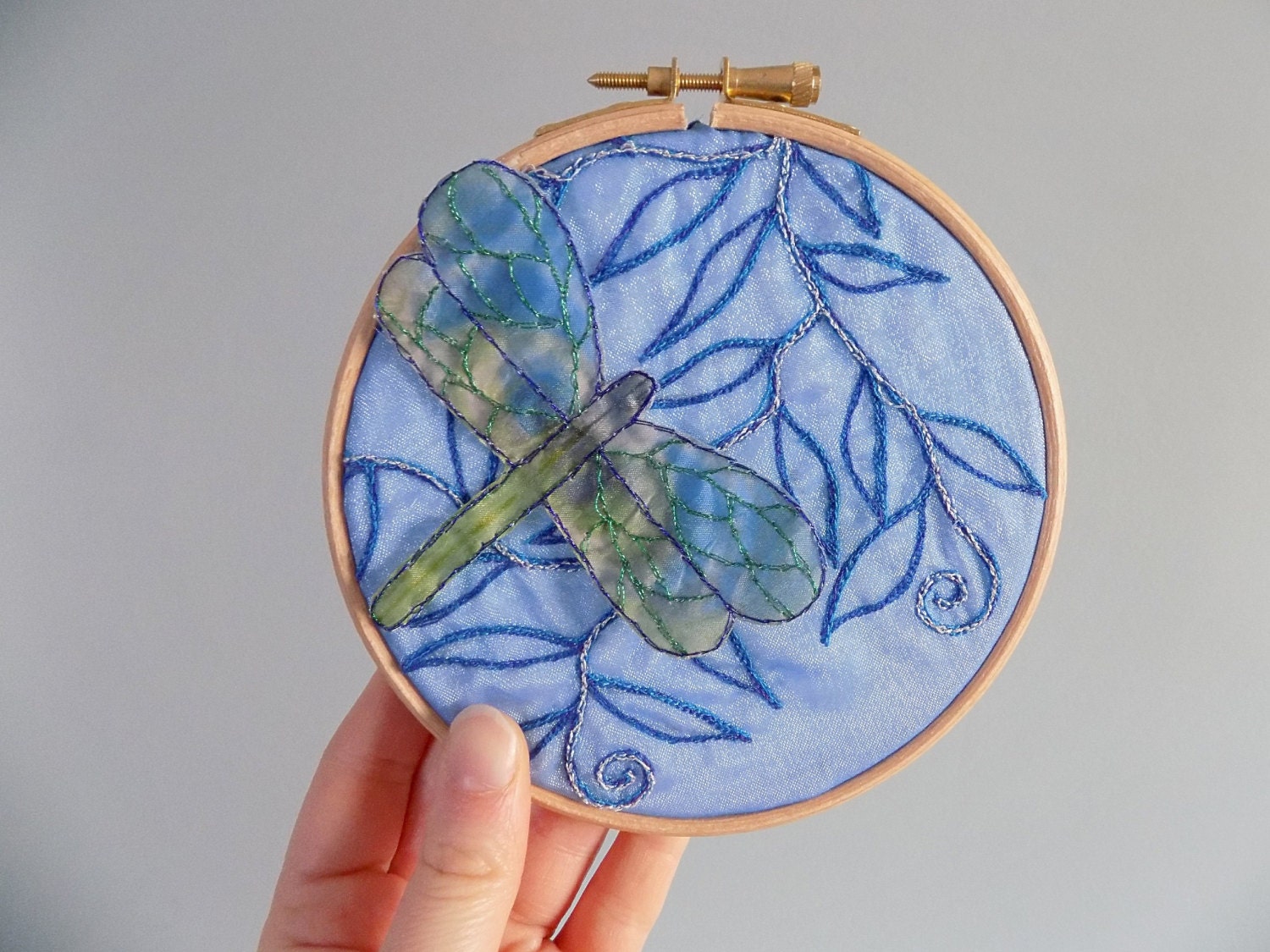 Embroidered dragonfly in a wodden embroidery by MyWingedFriends