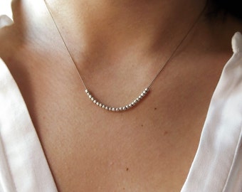Sterling silver necklace. Minimalist necklace. Fine silver minimalist necklace. Smooth fine silver beads on a brown silk thread.