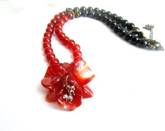 Gemstone flower necklace, carnelian necklace, carved stone flower pendant necklace, gemstone beaded necklace, orange black necklace