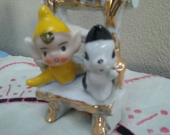 Vintage Pixie / Elf and Skunk on a chair Figurine kitsch Yellow pixies Elves