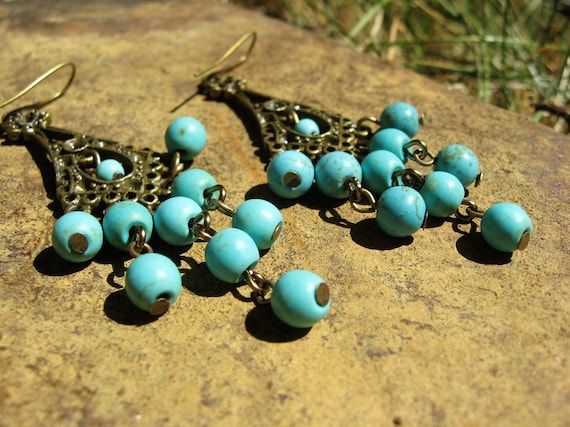 Items Similar To Brass Turquoise Howlite Chadelier Earrings On Etsy