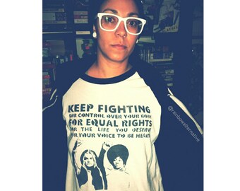 Keep Fighting t shirt tshirt feminist art feminism street art by Rainbow Alternative power to the people
