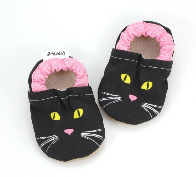 shoes with cat faces on them