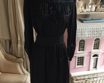 1930s /1940s black satin dress with bows. Outstanding condition