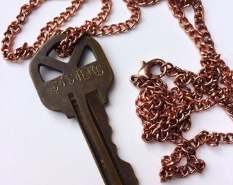 Custom stamped key necklace - SISTERS