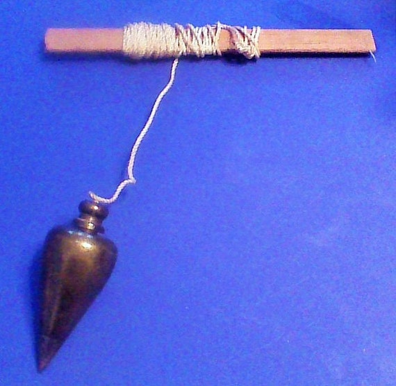 brass plumb bob with carbide tip and braided line